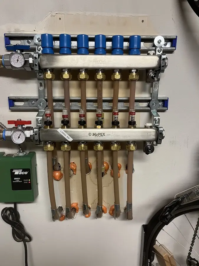 Plumber performing Sink Repair at a residential property in Sandy